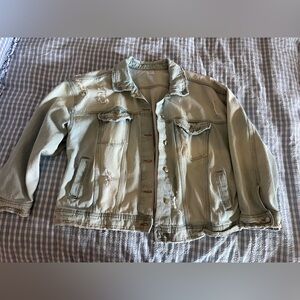 Woman's Plus Size Distressed Denim Jacket